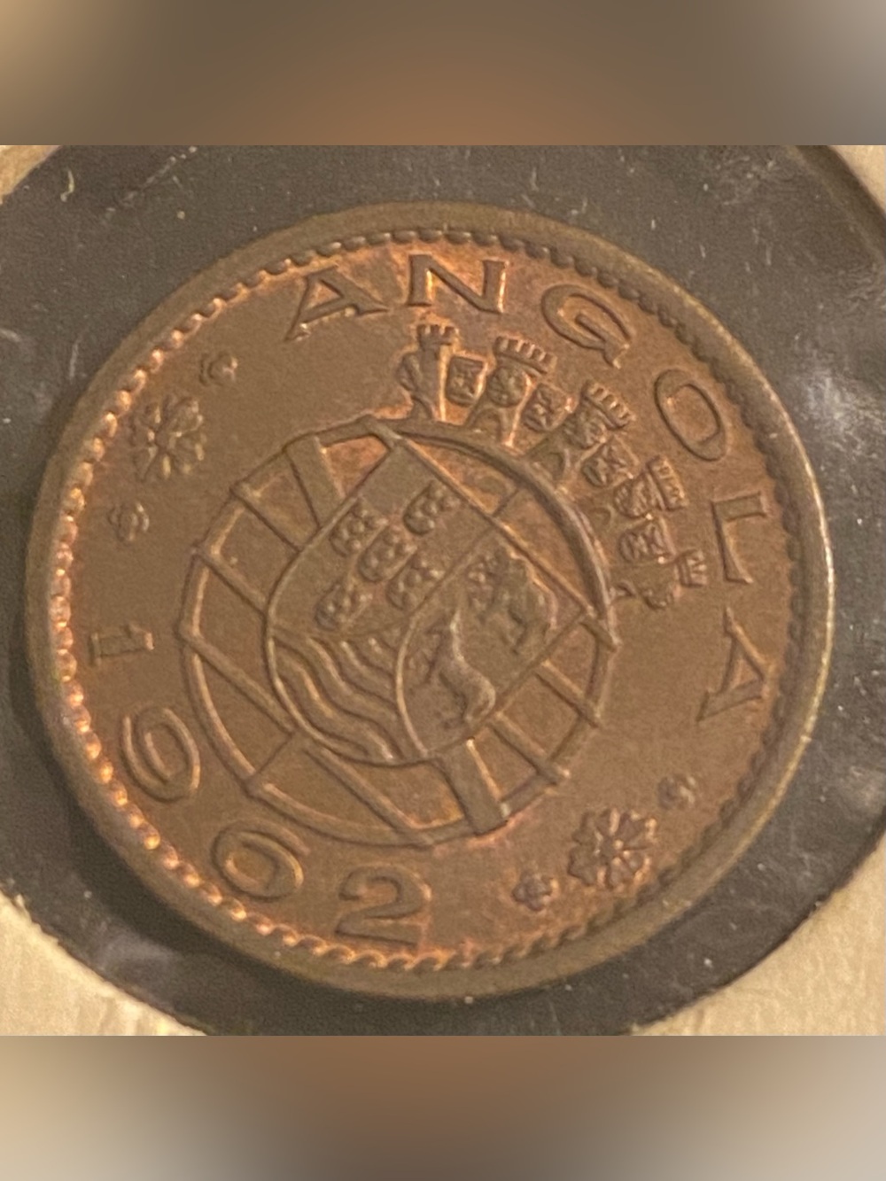 1962 Angola 20 Centavos coin, featuring a bronze composition.